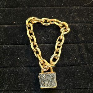 Henri Bendel Gold Tone Jet Setter Padlock Bracelet with Black Crystals